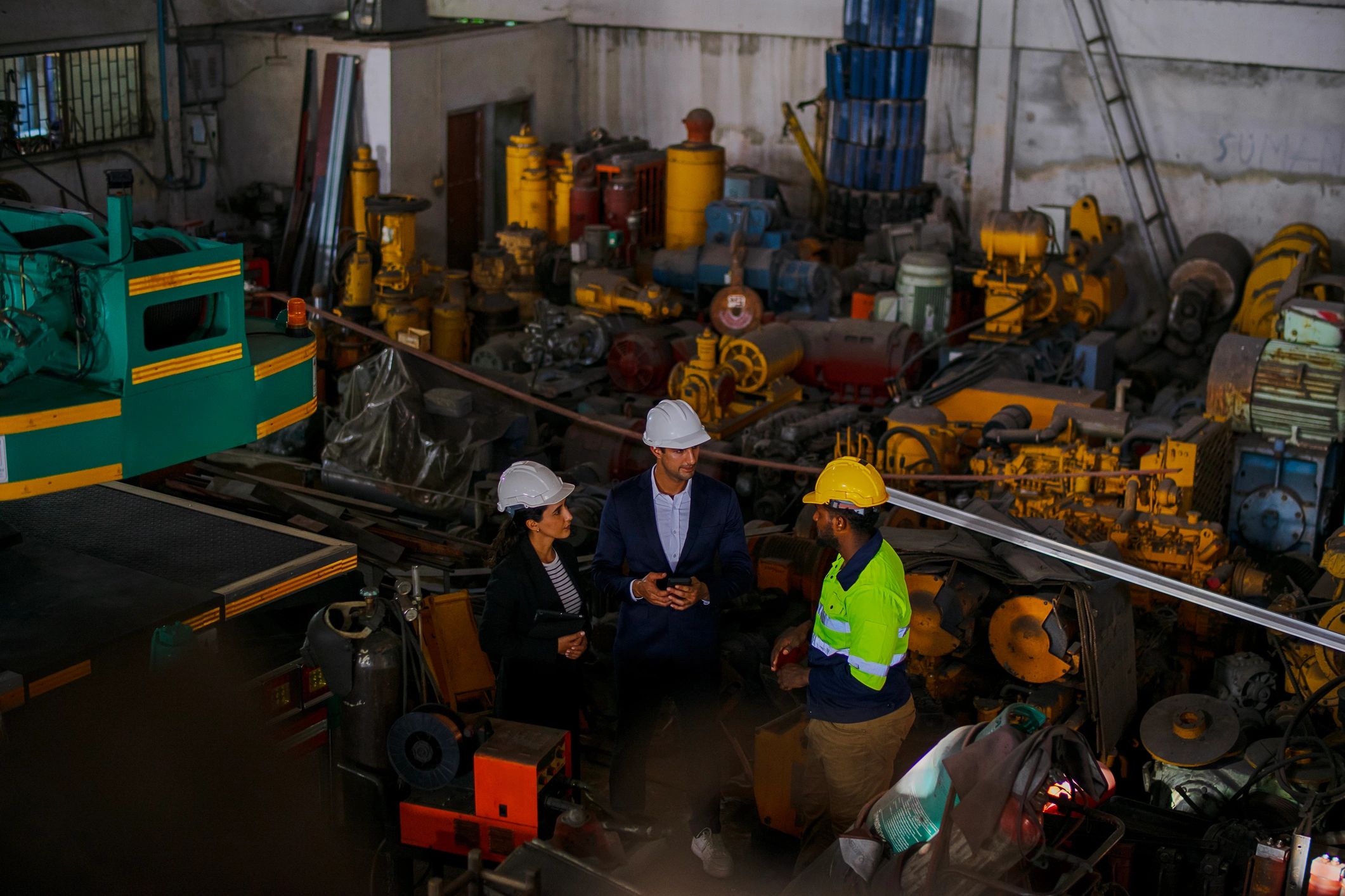 Industrial service team reviewing site requirements