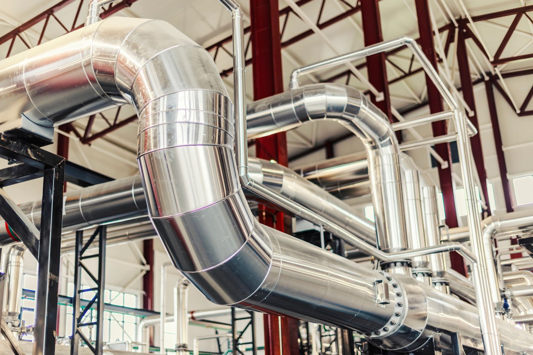 Industrial piping and parts inside manufacturing plant